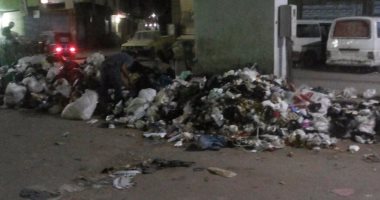 شكوى من تراكم القمامة بجوار كابينة تليفونات بشارع الملكة ببولاق الدكرور