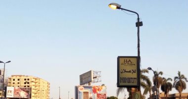  إضاءة أعمدة الكهرباء نهارا أعلى كوبرى أكتوبر فى منطقة الدقى