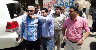 بالصور.. مدير أمن البحيرة يقود حملة لإزالة تعدى فى برج مصر للتأمين بدمنهور