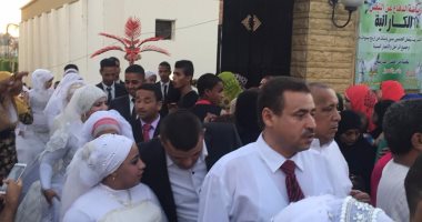 بالصور.. بدء مراسم حفل الزفاف الجماعى لـــ100 عريس وعروسة فى سوهاج