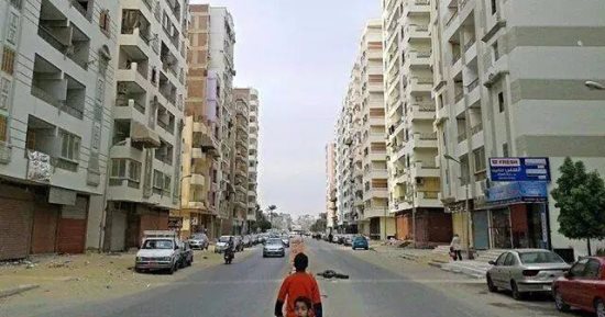 إنذار لشاغلى أبراج سكنية بالسويس متعدية على أراضى الدولة