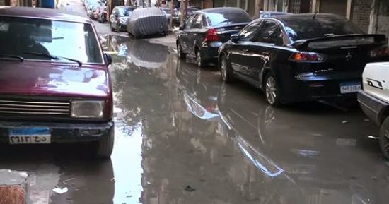 بالصور.. غرق شارع عمارات الشروق بالجيزة فى مياه الصرف الصحى