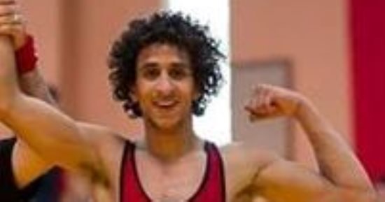 حسن حسن وشقيقه الهارب "دونت ميكس" فى بطولة العالم للمصارعة