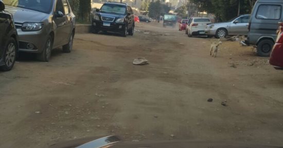 قارئ يشكو سوء حالة شوارع حدائق الأهرام ويطالب برصفها 