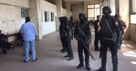 بالصور.. استنفار أمنى بجنايات المحلة قبل الحكم على 9 ضباط فى قضية قتل