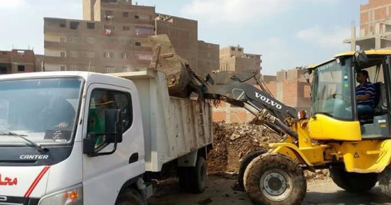 بالصور.. حملات نظافة وإطفاء حرائق متفرقة على الطريق الدائرى بميت حلفا