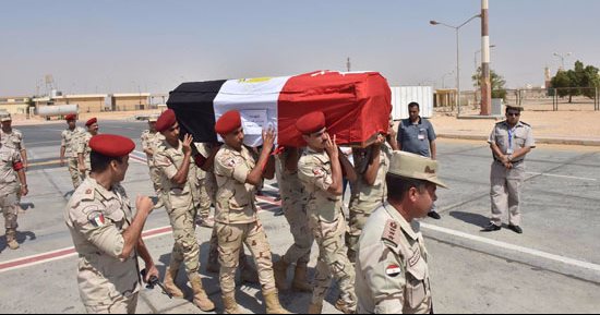 بالصور.. محافظ أسيوط يستقبل جثمان الشهيد رامى سليمان بمطار أسيوط الدولى