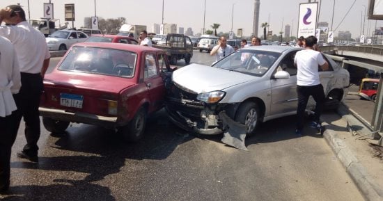 زحام مرورى بسبب تصادم سيارتين أعلى محور 26 يوليو