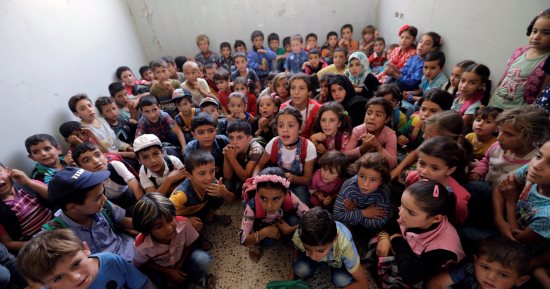 بالصور.. أطفال سوريا يعودون للدراسة بحلب على أنقاض دمار الجماعات الإرهابية