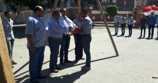 بالصور.. طلاب جامعة الأزهر فرع أسيوط يبدأون العام الدراسى الجديد بتحية العلم