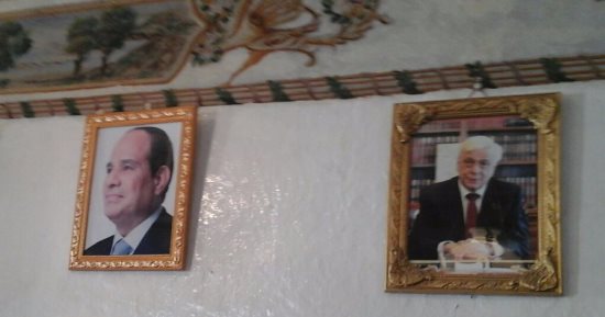 صورة الرئيس السيسى تزين غرفة استقبال دير سانت كاترين وجمعه يتناول طعام الكنيسة 