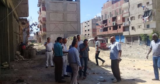 تنفيذ قرارات إزالة لعقارين مخالفين والتحفظ على معدات ومواد البناء بالإسكندرية