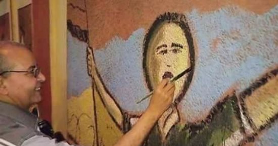 بالصور.. جدارية لبانوراما حرب أكتوبر على سور إحدى المدارس فى بورسعيد