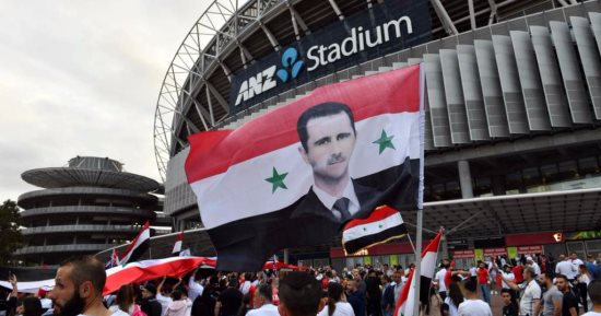  جماهير سوريا ترفع صور بشار الأسد فى مباراة أستراليا