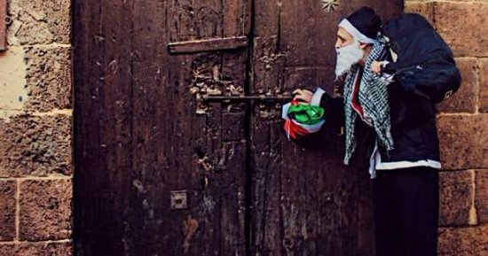 بابا نويل الفلسطينى.. سانتا كلوز يتضامن مع القدس ومصوره: السنة دى حداد