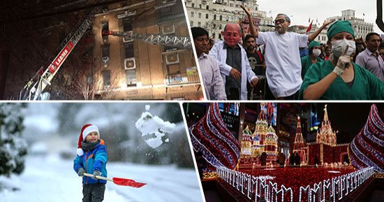صور.. العالم هذا الصباح.. أجواء احتفالية مبهرة بالكريسماس بروسيا.. استمرار موجة الصقيع الثلجية فى كندا وألمانيا.. مصرع 12 وإصابة 20 آخرين فى حادث دهس وحريق بنيويورك.. واحتجاجات ببيرو بعد العفو عن "فوجيمورى"