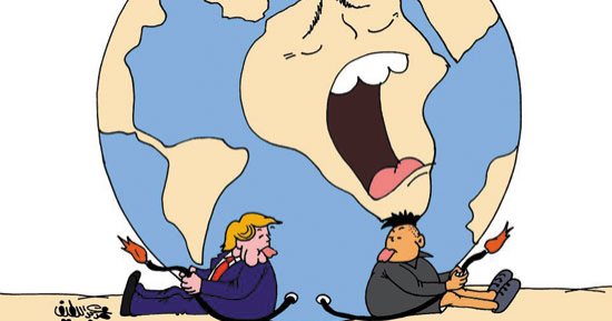 "المجنون" و"المخبول" يتصارعان على تدمير الأرض.. بكاريكاتير "اليوم السابع"