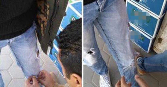 مصائب قوم عند قوم فوائد.. بعد منع دخول أصحاب البناطيل المقطعة الامتحانات.. وليد طور شغله بخيط وإبرة أمام الجامعة.. سد الفتحة بـ3 جنيهات.. وغرزة منه تنقذ مستقبل شاب.. وطالب:القرار لا يطبق على البنات