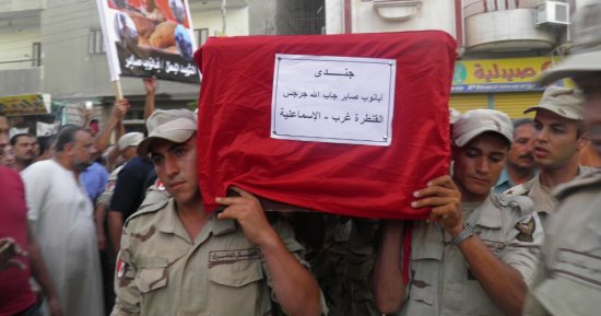 حتى لا ننسى جرائم الإخوان..المسلمون والأقباط فى جنازة واحدة للشهيد أبانوب صابر.. والدة البطل: الإرهاب مفرقش بين المسلم والمسيحى وكل أولادى فداء لتراب مصر.. وتؤكد: الدولة خلدت اسم ابنى على أحد المشروعات القومية 