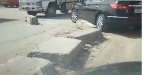 شكوى من الفوضى المرورية أسفل الطريق الدائرى بالوراق وكسر الحاجز الخرسانى