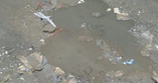 صور.. غرق شارع عبدون بشير فى الهرم بمياه الصرف الصحى