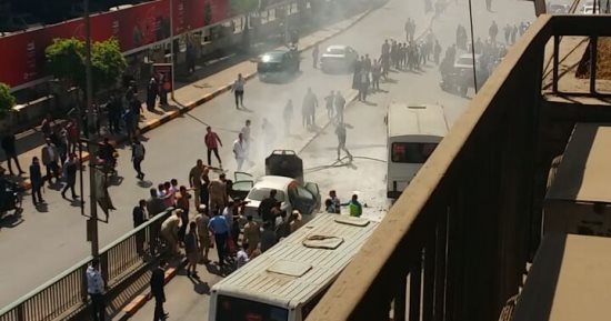 صور .. اشتعال سيارة ملاكى على محور 26 يوليو والمارة يخمدون النيران
