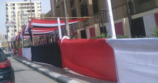 مدارس القاهرة تتزين بأعلام مصر لاستقبال الناخبين فى انتخابات الرئاسة.. صور