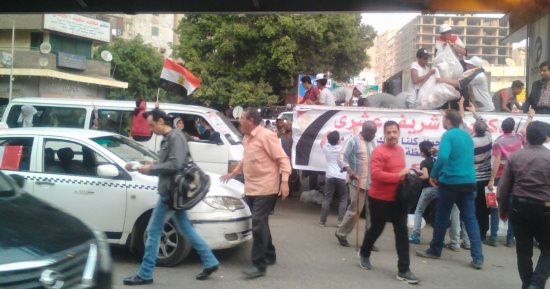 صور.. "كلنا معاك من أجل مصر" تنظم وقفة بالدقى لحث المواطنين على التصويت