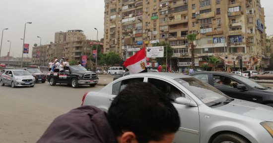 صور.. مسيرة بالسيارات بشارع جامعة الدول العربية للحث على التصويت بالانتخابات