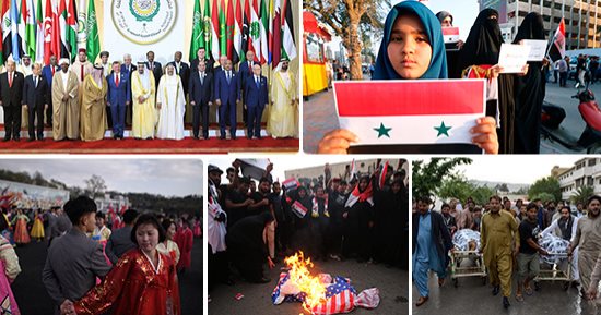 صور..العالم هذا المساء..حرق علم أمريكا خلال تظاهرة فى بغداد احتجاجا على قصف سوريا.. زعماء العرب يشاركون فى القمة الـ29 بالسعودية..مقتل شخصين فى هجوم خارج كنيسة بباكستان..كوريا الشمالية تحتفل بذكرى ميلاد مؤسسها