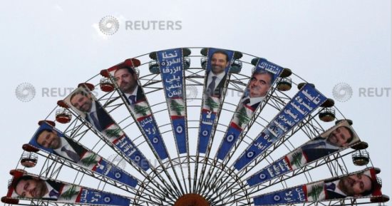 صور.. انتشار ملصقات الدعاية الانتخابية فى شوارع لبنان