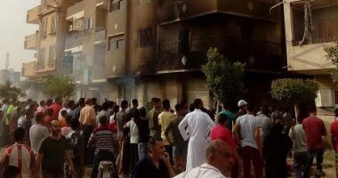 إخماد حريق بعمارة سكنية بالسويس