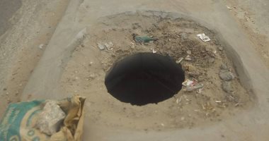 صور.. بلاعة بدون غطاء تهدد المارة على رصيف كورنيش المعادى