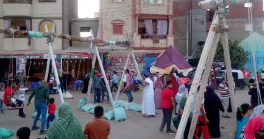 صور.. الملاهى وألعاب الأطفال بريف الدقهلية تزدحم بالزوار احتفالا بعيد الفطر