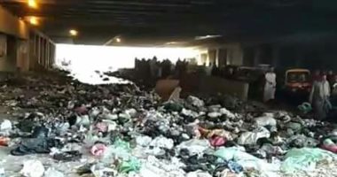 شكوى من تراكم القمامة أسفل كوبرى روض الفرج الجديد