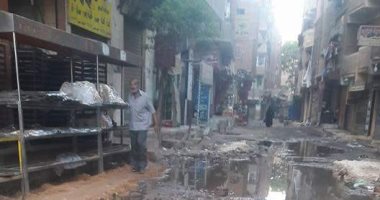 أهالى شارع المزرعة بشبرا الخيمة يشكون من انتشار مياه الصرف الصحى