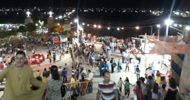 صور.. أقباط أسيوط يحتفلون بعيد حالة الحديد بـ"زفة أيقونات العذراء"