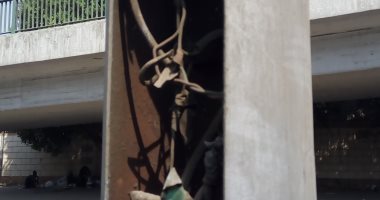 صور.. شكوى من أسلاك بلا أغطية بأعمدة الكهرباء بالدقى