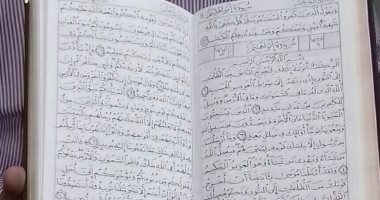 صور.. مواطن يكتب المصحف بخط يده فى 7 أشهر.. ويؤكد: سأسجله بالأزهر
