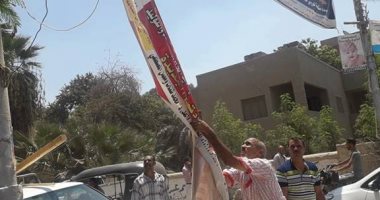 حملة لرفع الإعلانات غير المرخصة من شوارع بنى مزار بالمنيا
