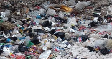قارئ يشكو تراكم القمامة بشارع الصحابة فى أبو النمرس بالجيزة