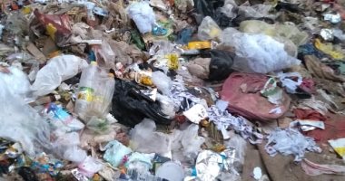 قارئ يشكو انتشار القمامة بأرض فضاء بشارع الدكتور فؤاد سعيد بالعمرانية الغربية