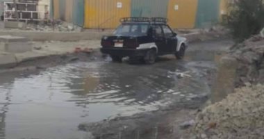 قارئ يشكو من غرق شارع القومية بمياه الصرف الصحى بالجيزة 