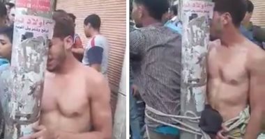 مواطنون يربطون لصين فى عمود نور بسبب سرقتهما سيدة وابنتها بالمنصورة