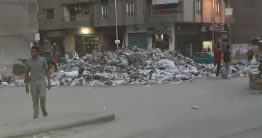 قارئ يشكو من تراكم القمامة أسفل الدائرى بالحرانية فى الجيزة