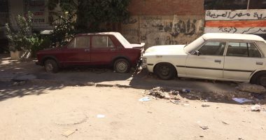 مرور الجيزة يرفع 12 سيارة ودراجة بخارية متروكة فى حملات بالشوارع 