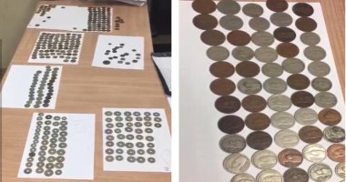 سلطات مطار القاهرة تحبط محاولة راكب تهريب 324 عملة معدنية أثرية 