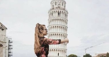 لو مسافر إيطاليا.. اعرف ازاى تتصور مع برج بيزا بطريقة مختلفة صور