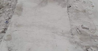 صور.. شكوى من تهالك الرصيف وتراكم القمامة بشارع المنيل