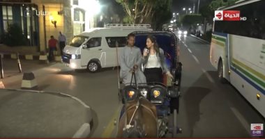 ريهام سعيد تتجول بـ"الحنطور" على كورنيش الأقصر